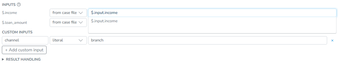 The Inputs list of the Decide task: the income path mapped from the case file with its autocomplete open, the loan amount left unmapped, and a custom channel input below